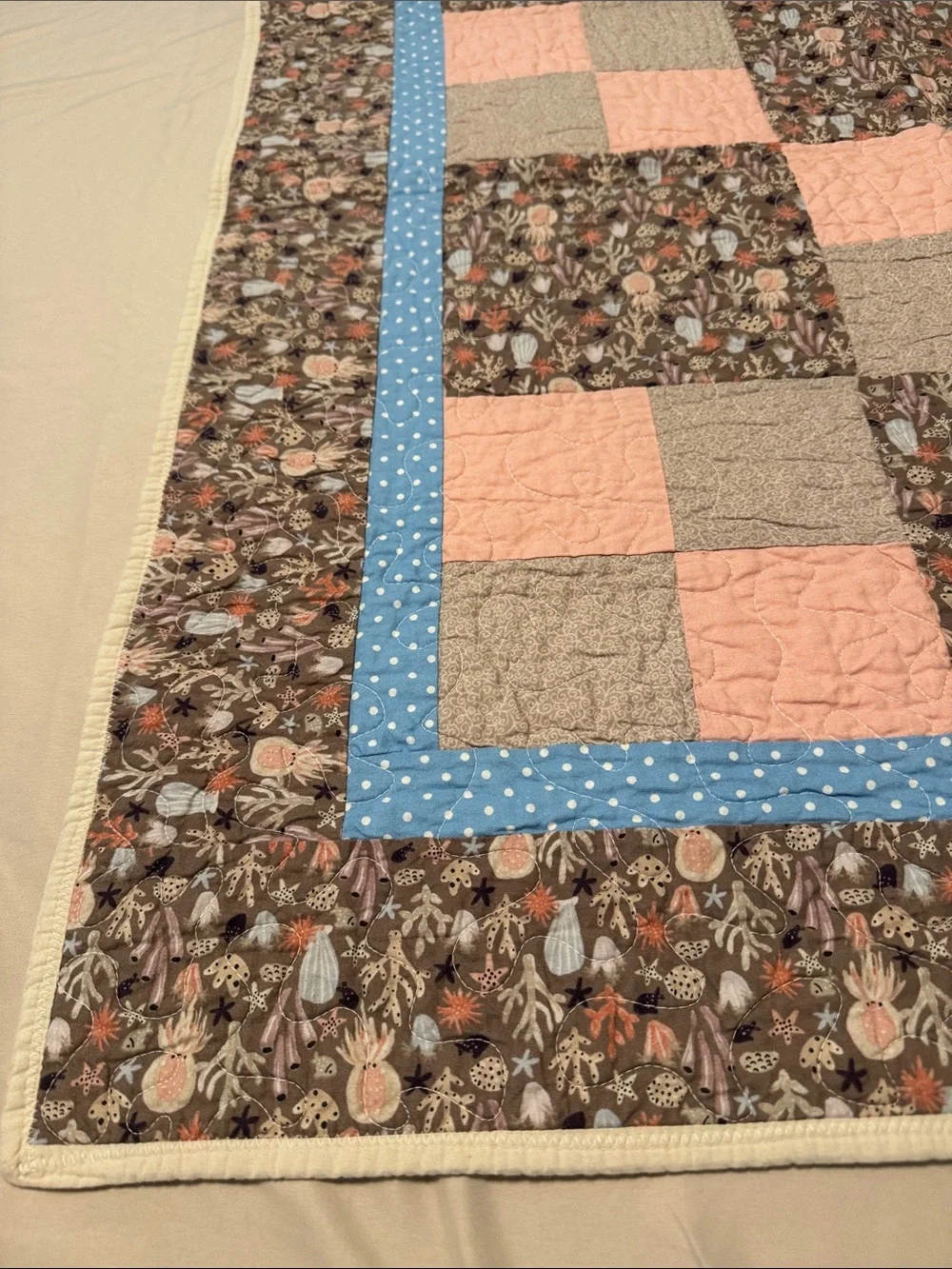 Handmade Floral Patchwork Baby Quilt with seashells in Pink, Blue & Brown